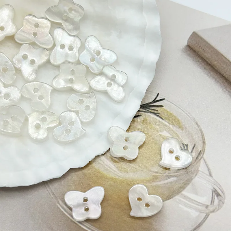50Pcs/lot Off white two eyed heart-shaped butterfly resin AB color button dress knitted cardigan shirt socks decoration N794