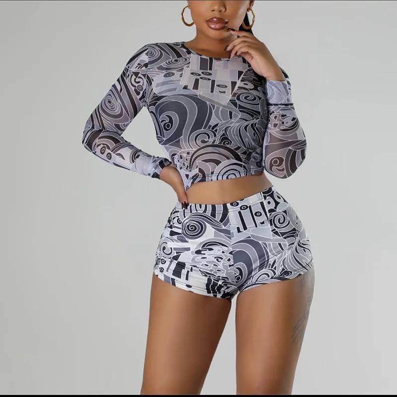 Irmã estrela terno feminino atacado moda sexy malha padrão impressão manga longa flor shorts boate festa conjunto de duas peças