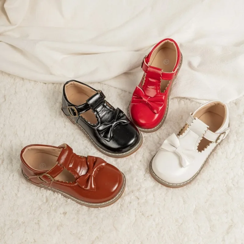 

New 2025 Children's Leather Shoes Simple T-strap Girls Flat Shoes Fashion Princess Bowknot Kids Causal Ballet Shoes Versatile