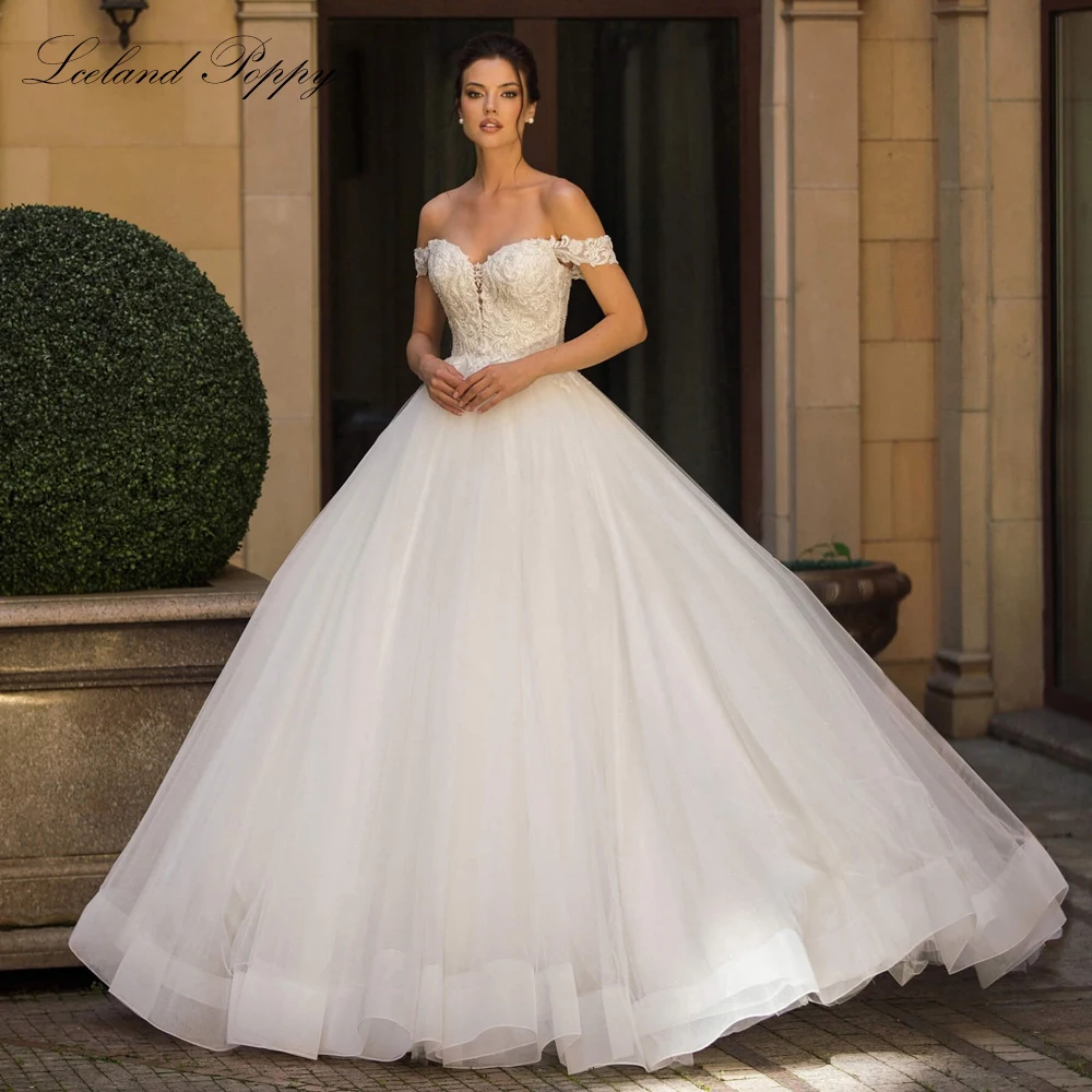 

Lceland Poppy Customized Ball Gown Tulle Wedding Dresses Boat Neck Pearls Beaded Lace Bridal Gowns with Court Train