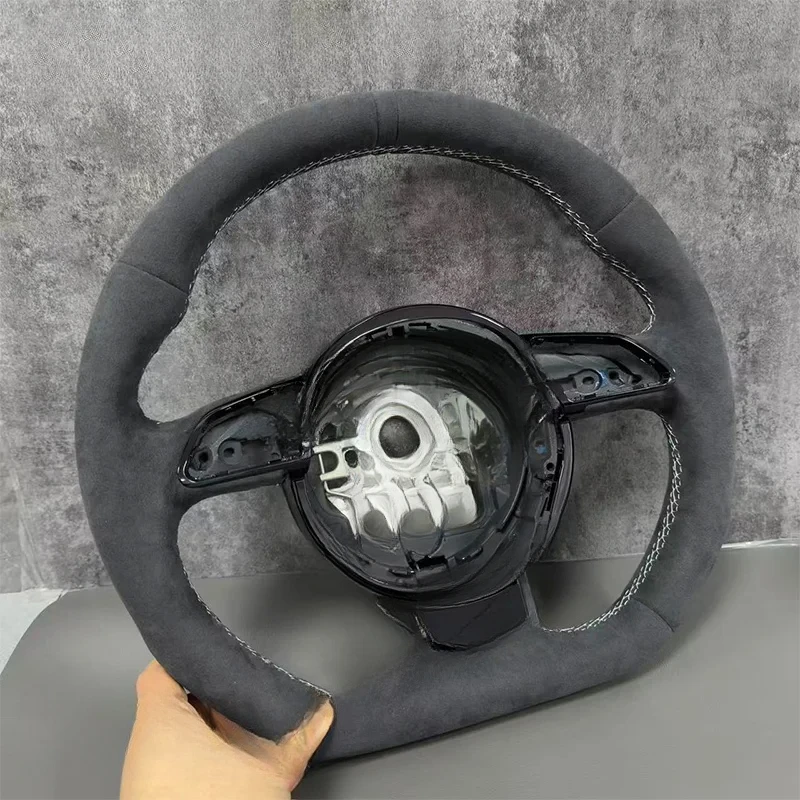 

Улучшенный руль для Audi A6 C7 с отделкой из замши и возможностью выбора цвета швов.