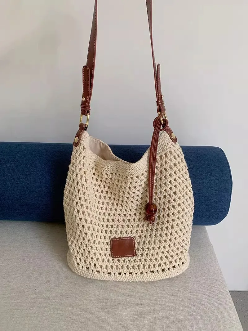 

Knitted hollow bag for women 2025 new beach vacation tourism beach bag, single shoulder armpit bag