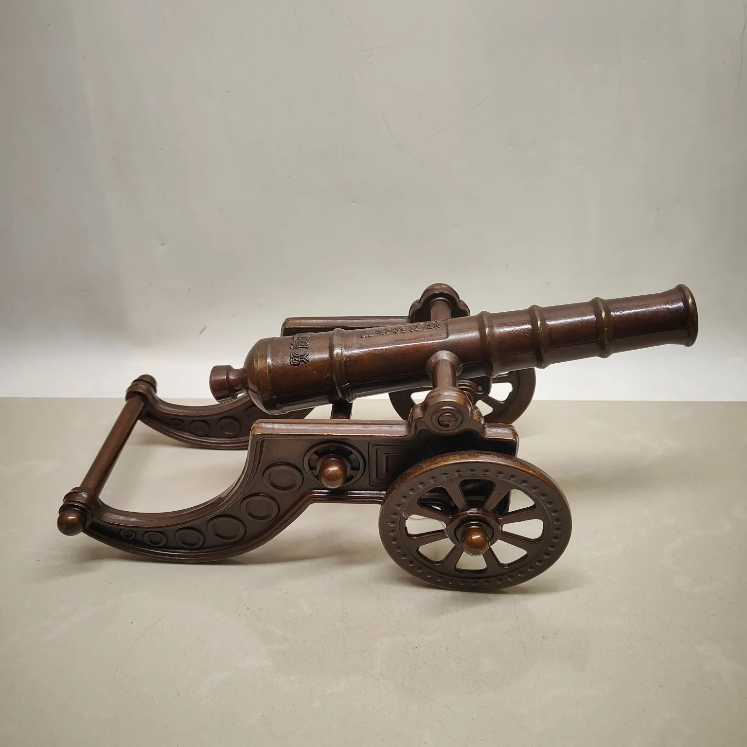 A large decorative cannon used for warding off evil spirits and protecting the home.,Free shipping