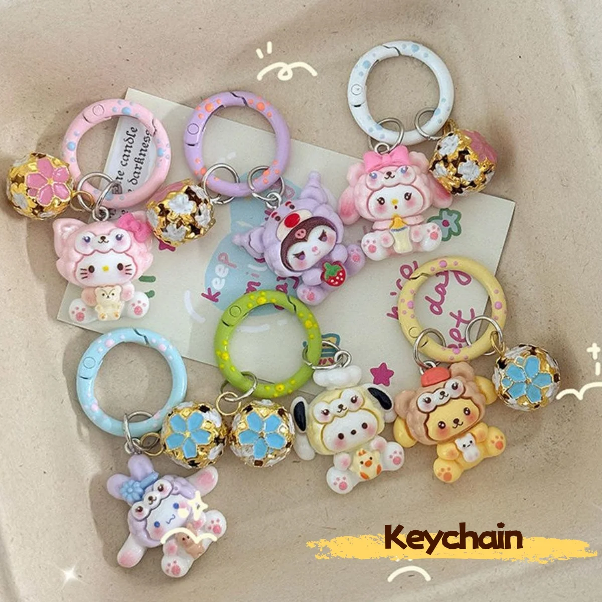 

Kawaii sanrio cat hello kitty cartoon bell keychains schoolbag cute girl accessories birthday gift anime keychain
