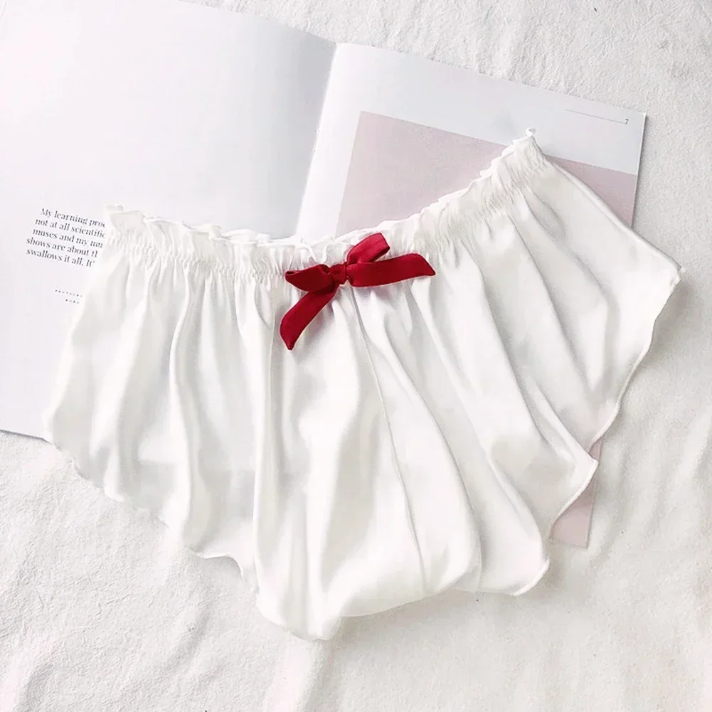 Vendita calda moda donna raso di seta solido lingerie pigiama fondo intimo mutande pantaloncini breve tinta unita fiocco mutande