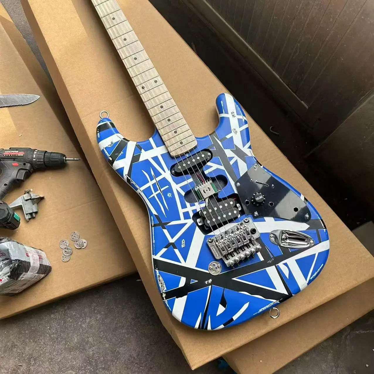 Products in stock, Eddie Van Halen blue, black and white striped electric guitar, wholesale and retail