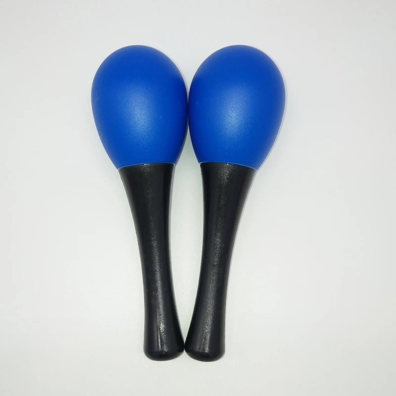 Plastic maracas Orff instrument players hold plastic maracas Toddlers Early education Children grasp egg maracas