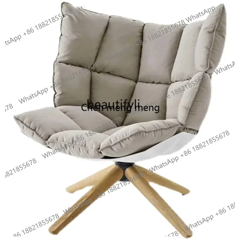New Light Luxury Danish designer Nordic leather single sofa chair rice husk muscle chair to discuss fabric art