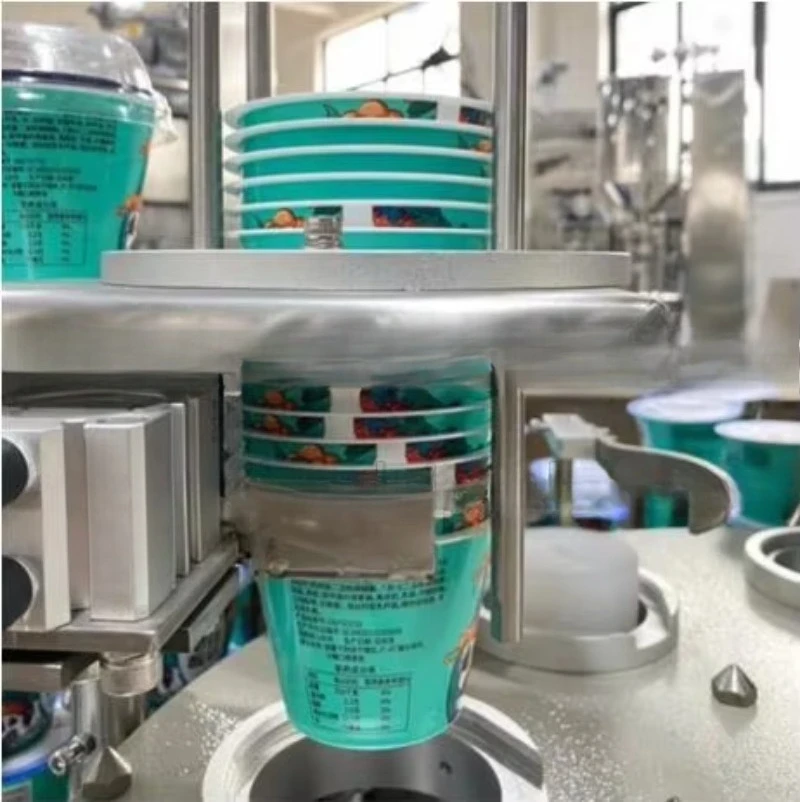 Automatic Yogurt Cup Filling Sealing Machine Packing Machine Aluminium Foil Sealing Machine