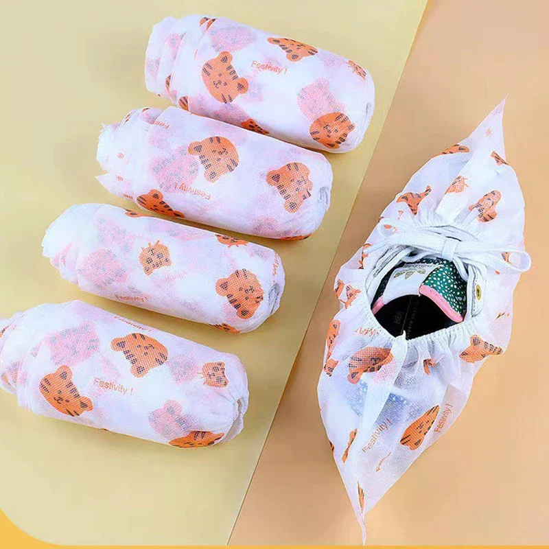 ถุงคลุมรองเท้าแบบใช้แล้วทิ้งลายการ์ตูนหนา 50 ชิ้น, ถุงคลุมรองเท้ากันลื่นสำหรับใช้ในบ้าน, ถุงคลุมรองเท้าระบายอากาศได้