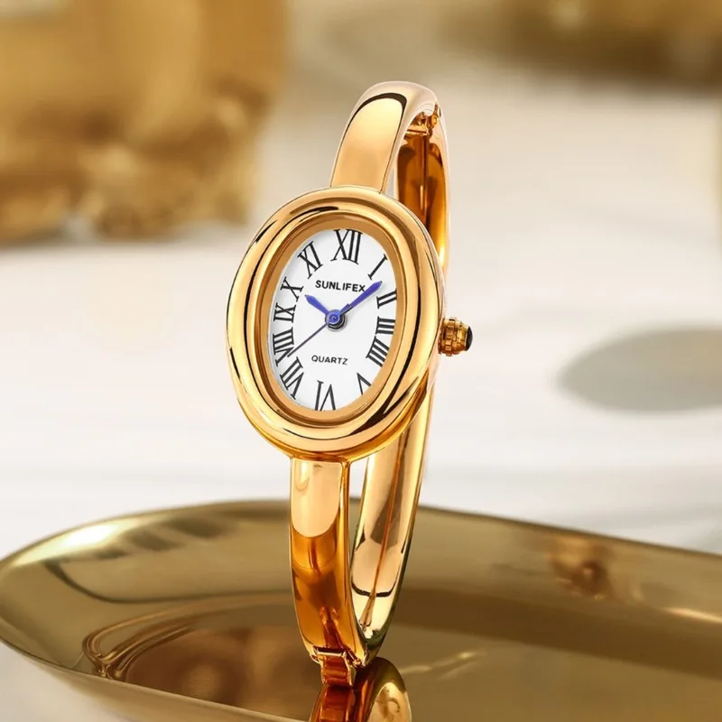 Reloj de pulsera de oro de marca famosa para Mujer, Reloj de cuarzo con esfera ovalada y tachuelas de diamantes, regalos de lujo, Reloj de pulsera para Mujer