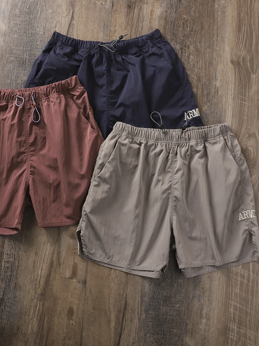 

Ретро американский легкий дышащий летний мужской спортивный фитнес с вышивкой букв свободный прямой тихий четверть orts