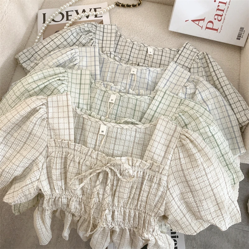 French pleated waist waist bubble sleeve plaid shirt women\'s summer design sense niche square collar show collarbone top