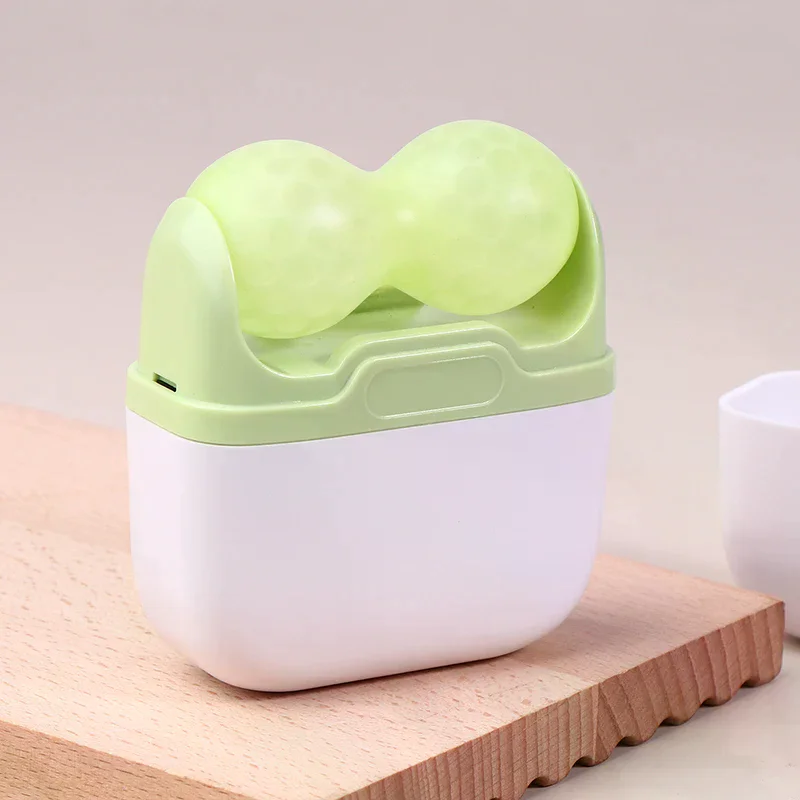 Rouleau de glace pour le visage à Double tête, utilisé pour le massage du visage et de la tête, en matériau en résine, sans parfum ni batterie