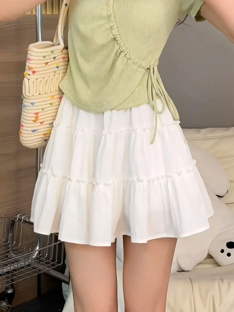 

Белая плиссированная юбка А-силуэта с высокой талией, женская летняя юбка с эластичным поясом, утягивающая, удлиняющая ноги, короткая юбка-кейк в корейском стиле