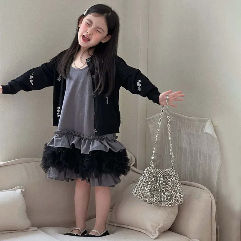 Korean girls' spring 2026 new stylish floral cardigan top, mesh suspender splicing half skirt two-piece set