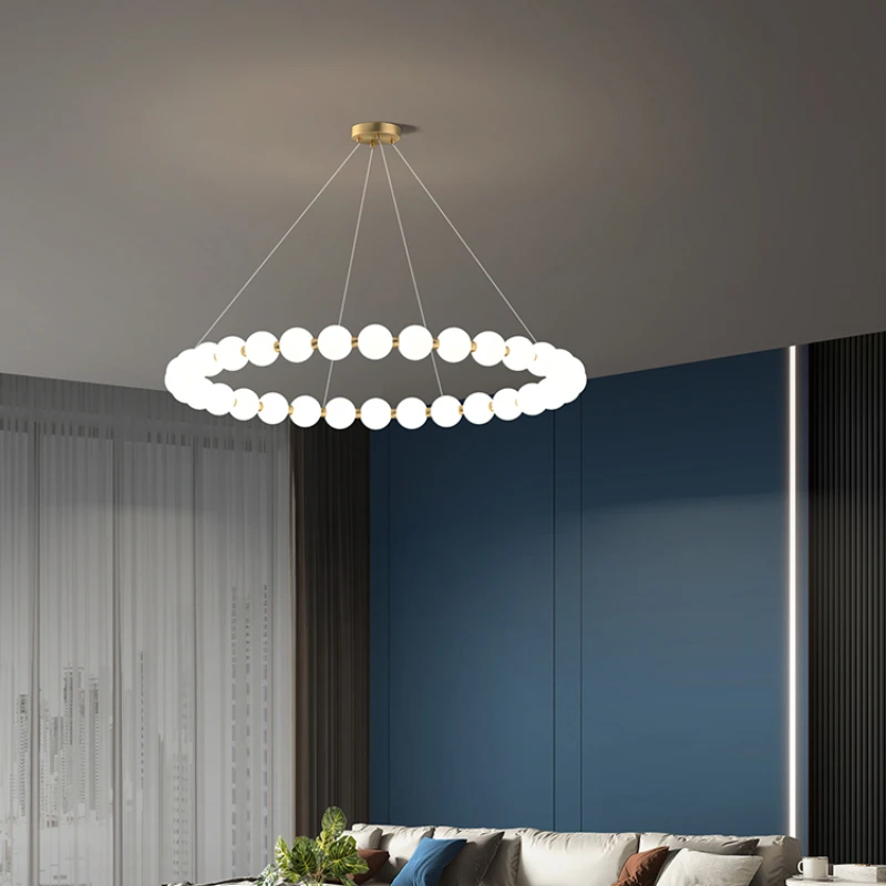 

All-copper French living room chandelier Nordic modern light luxury simple personalized restaurant cream wind pearl lamp