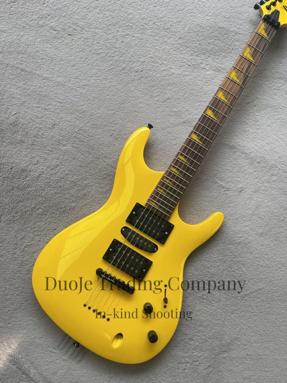Yellow guitar, thin-body guitar, fixed bridge, HH pickup, solid wood body with maple neck, yellow inlaid fretboard. view 3