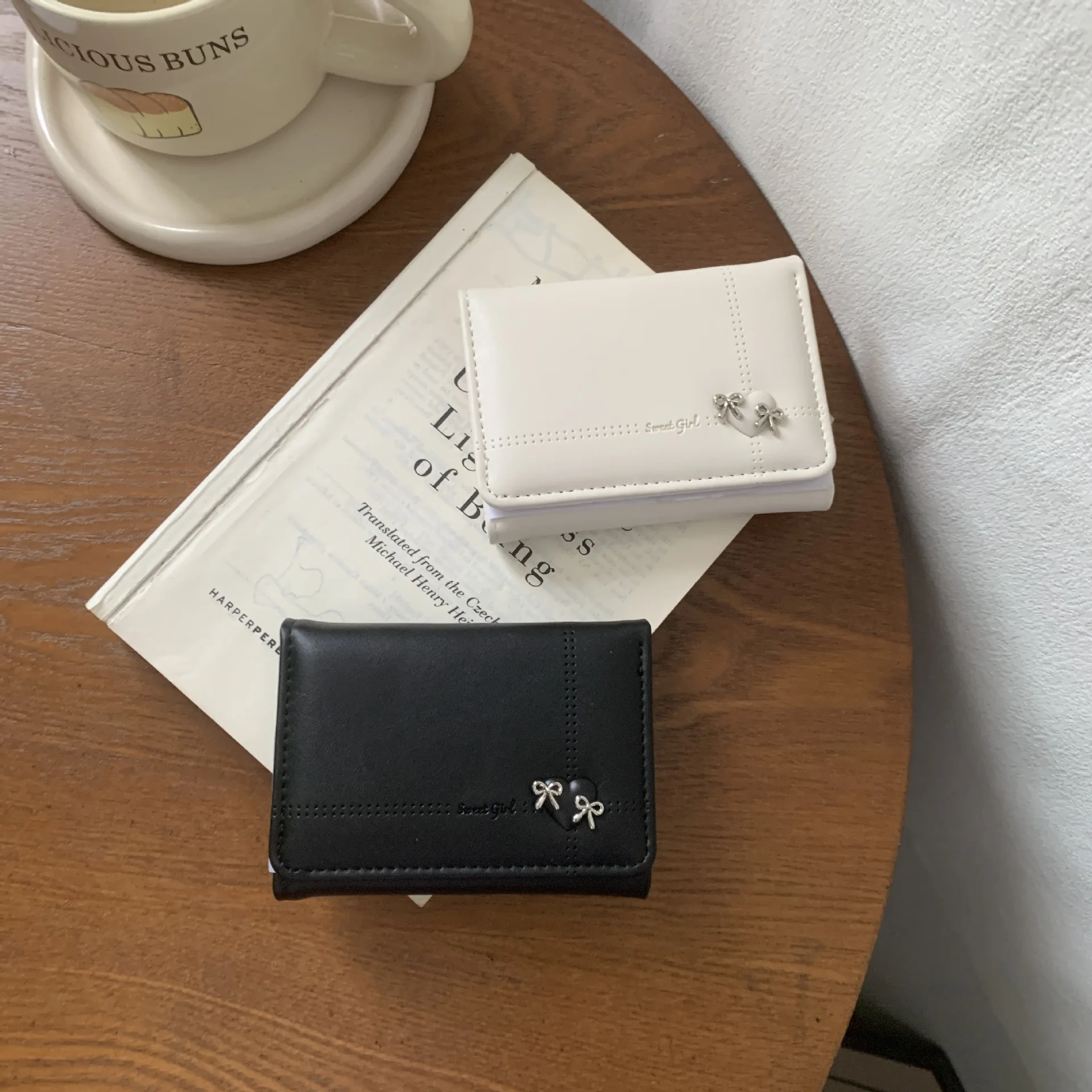PU leather cute bow ladies short purse simple short three fold portable student cute coin purse card bag