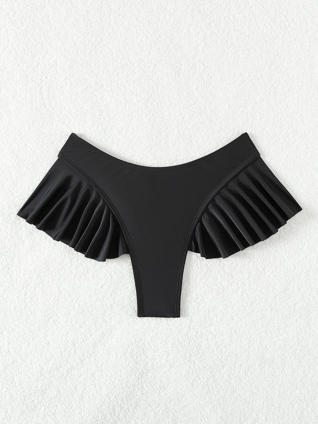 Low-slung thong with side ruffle-edge plain bikini