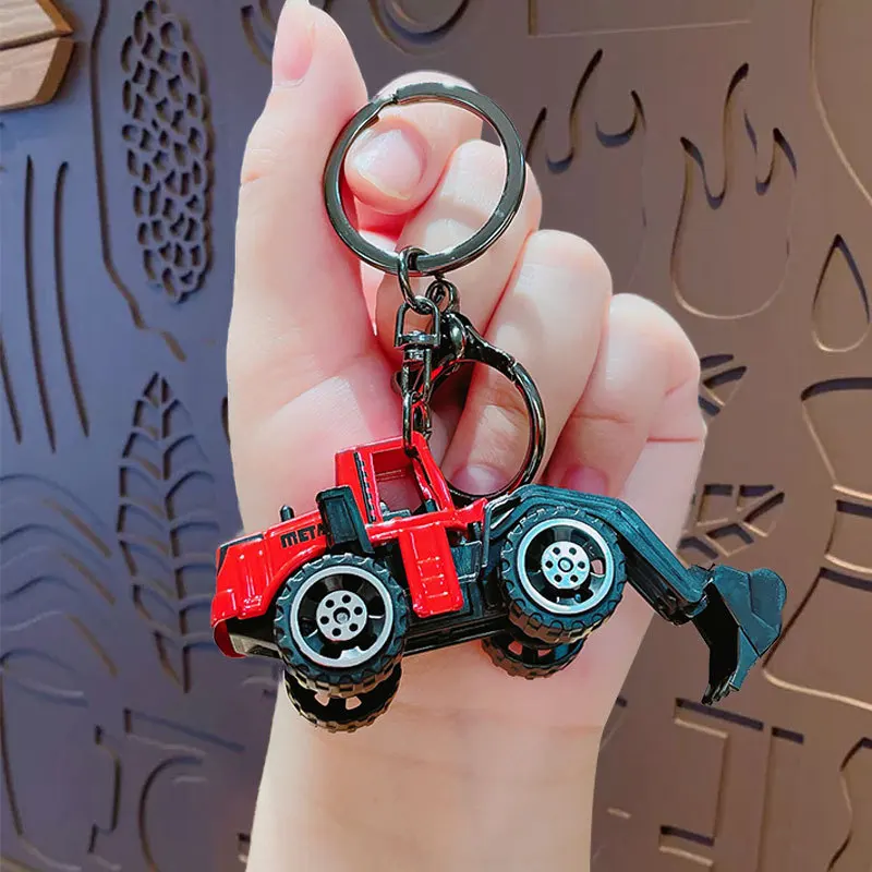 Creative Mini Alloy Engineering Inertia รถของเล่นพวงกุญแจจี้การ์ตูนที่สมจริง City Excavator Bulldozer ดึงกลับรถของเล่น