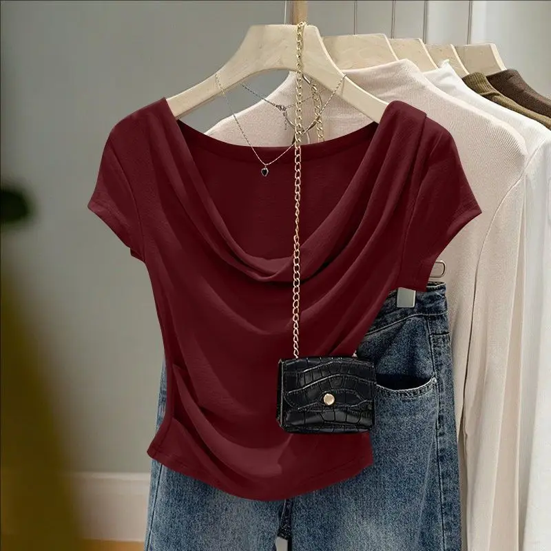 Nueva camiseta de verano para mujer, diseño informal, color sólido, corte ajustado, estilo irregular, versátil, manga corta, estilo coreano de moda.