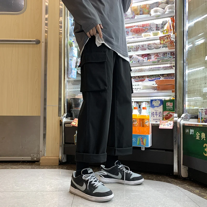 

Hip Hop Cargo Pants Men Joggers Harem Pants Multi-Pocket Ribbons Man Sweatpants Casual Fashion Men Woman Trousers Streetwear 5XL