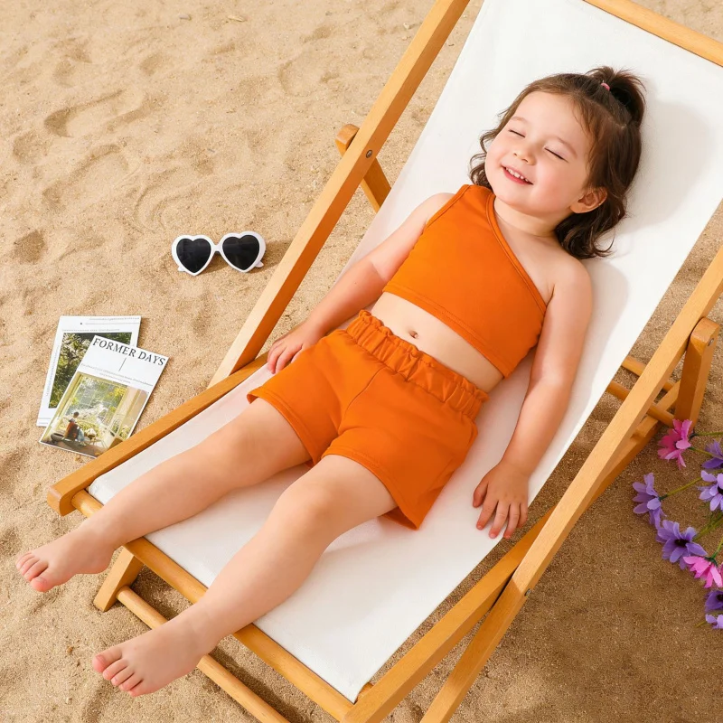 

Summer new style for girls: vibrant orange skin-friendly breathable one-shoulder crop top and shorts eye-catching set