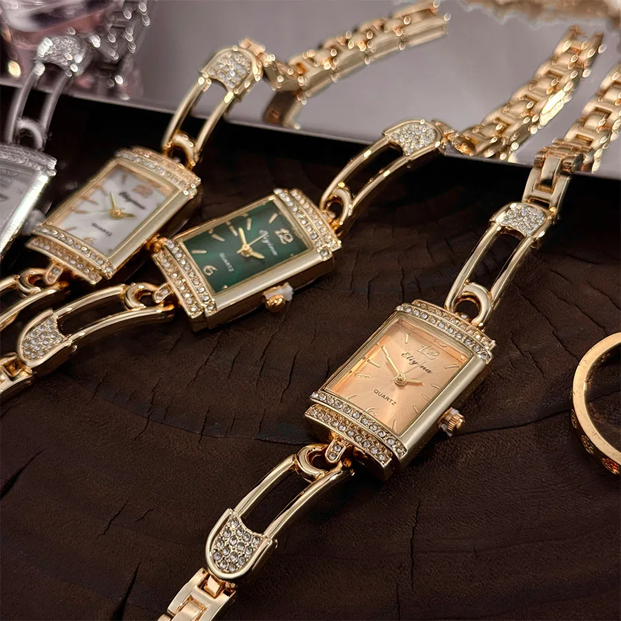 موضة جديدة دبوس كوارتز ساعة نسائية فاخرة الحد الأدنى الراقية جولة قوس الزجاج الماس مرصع مربع ساعة اليد