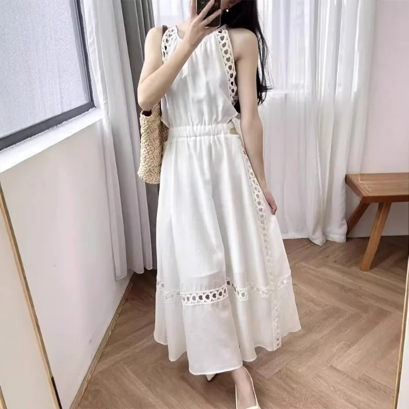 This French Vacation-style White Linen Lace Crocheted Dress Is Sleeveless Halter-neck and Waist-showing for Summer Fashion 2026