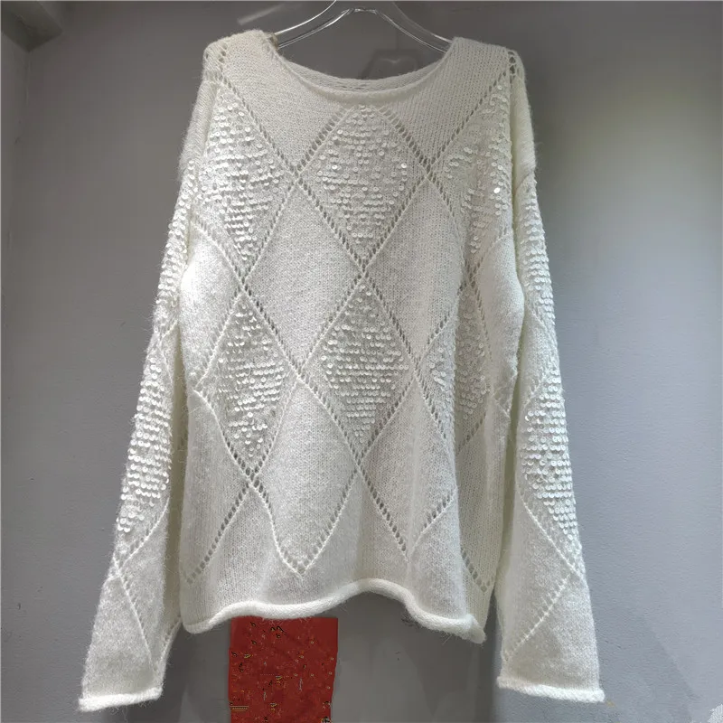 Frans geïnspireerd grijs gebreid pailletten. Kenmerken een zacht, pluche gewatteerd patroon voor een elegante, gezellige chique look.