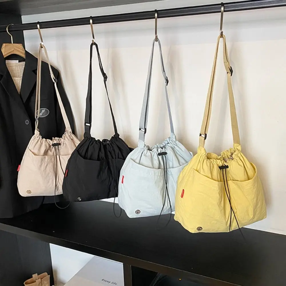 

Korean Style Pleated Drawstring Bucket Bag Large Capacity Handbag Nylon Shoulder Bag Solid Color Waterproof Cloth Crossbody Bag