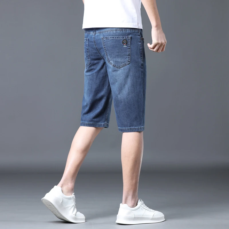 2024 New denim shorts for men's summer  new capris loose straight leg knee length youth elastic cargo jeans  men clothing