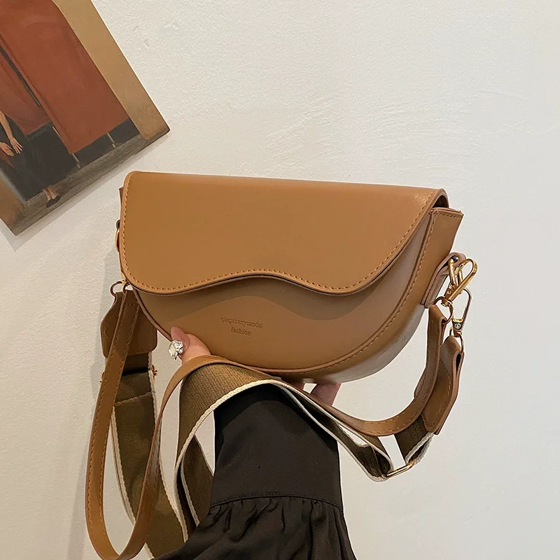 

Women's Vintage Solid Color PU Leather Crossbody Bag with Wide Strap Small Saddle Shoulder Underarm Fashion Bag