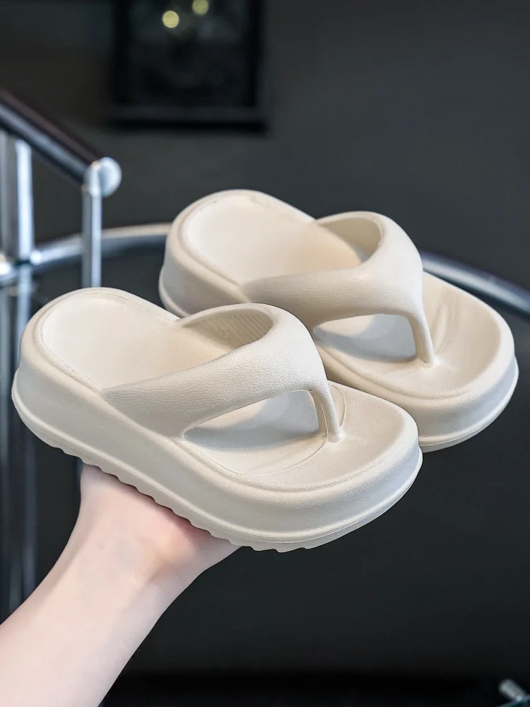 

2025 summer new girls' flip flops thick-soled heightened cool flip flops seaside beach slippers