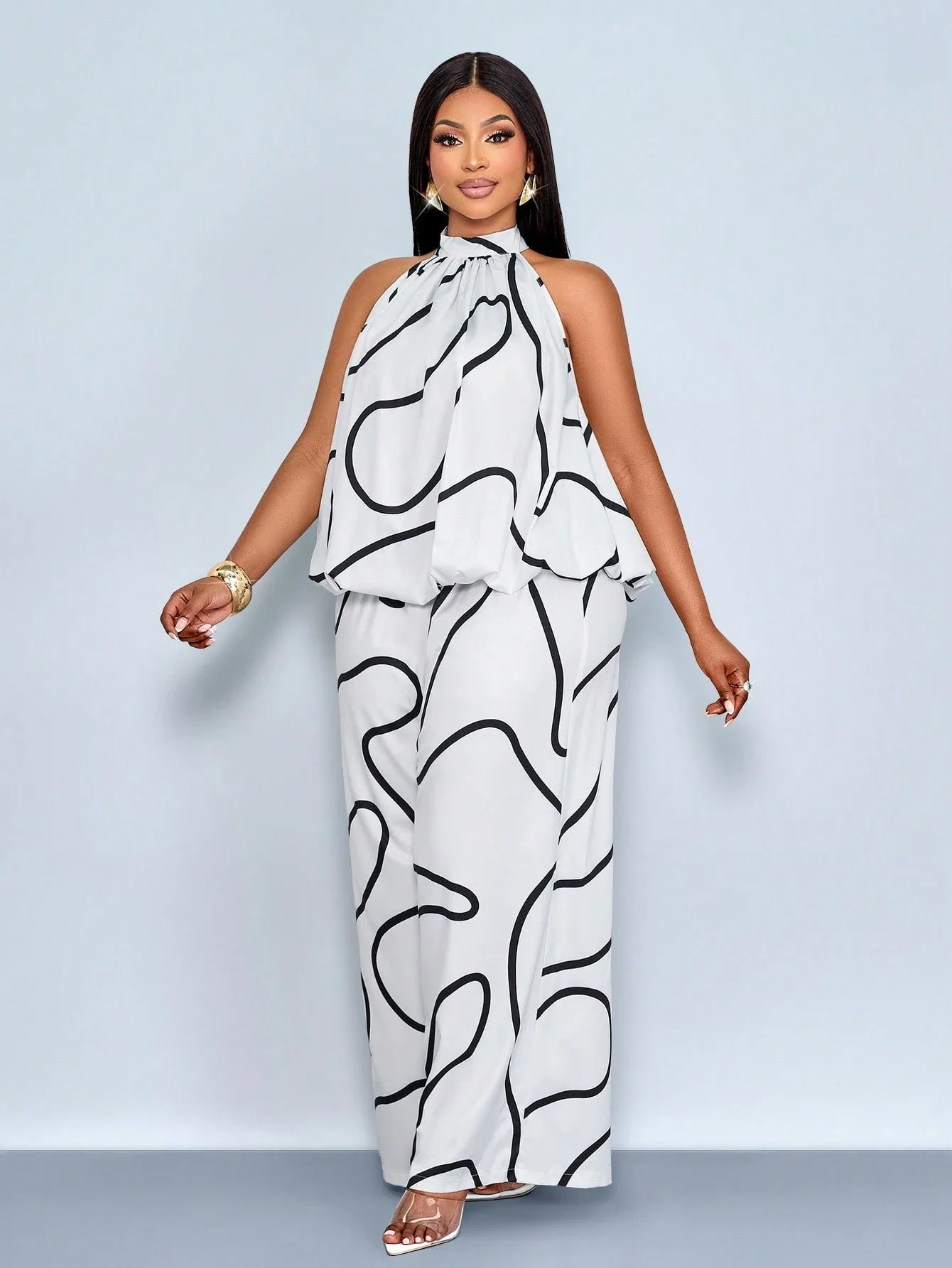 

Plus Size Women Halter Neck Loose Two Piece Set With Abstract Print Wide Leg Pants