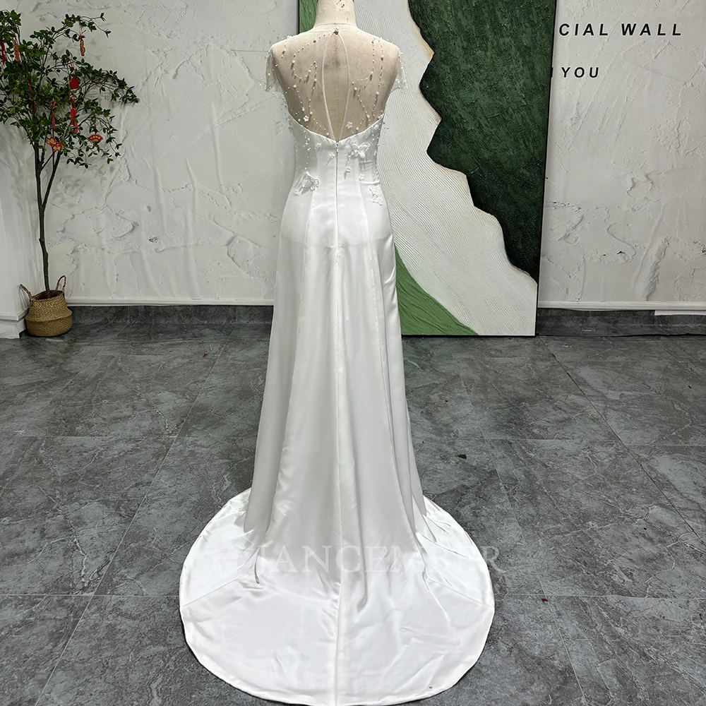 Dostosowane seksowna suknia ślubna z krótkim rękawem i odkrytymi plecami linia A nowa suknia ślubna z koralikami elegancka O-Neck plaża suknia dla panny młodej Vestidos de novia