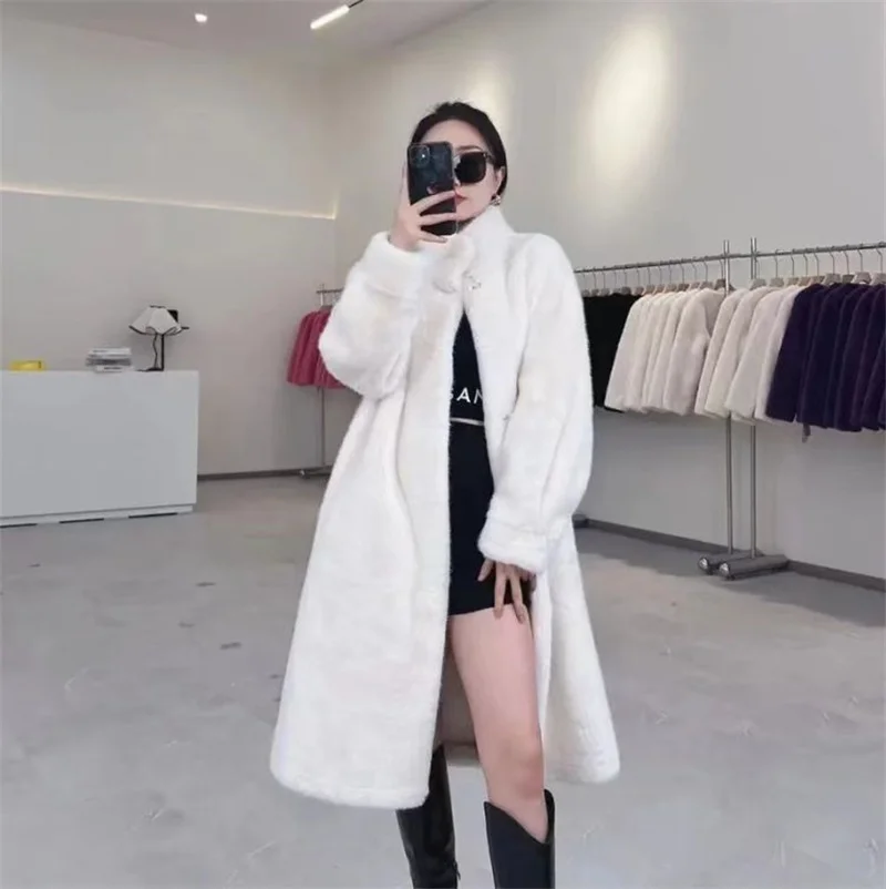 2025 Design Sense nuevo abrigo de piel sintética chaqueta de piel integrada para mujer cortavientos peludo suave grueso de longitud media prendas de vestir exteriores