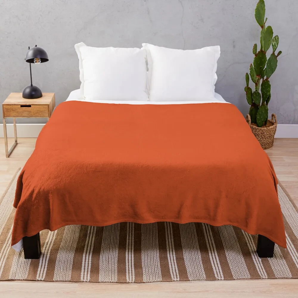 Dark Orange Solid Throw Blanket Plaid on the sofa Designers Blankets