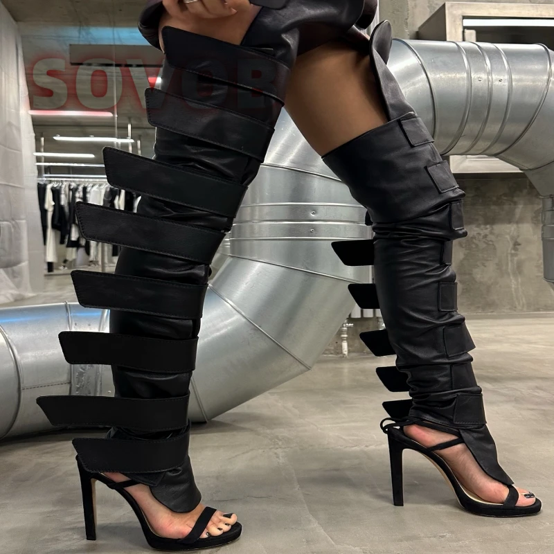 خطاف أسود وحلقة الفخذ عالية التمهيد الانزلاق على النساء رقيقة أحذية عالية الكعب موضة الحفلات فوق الركبة التمهيد 2025 Zapatos Para Mujere