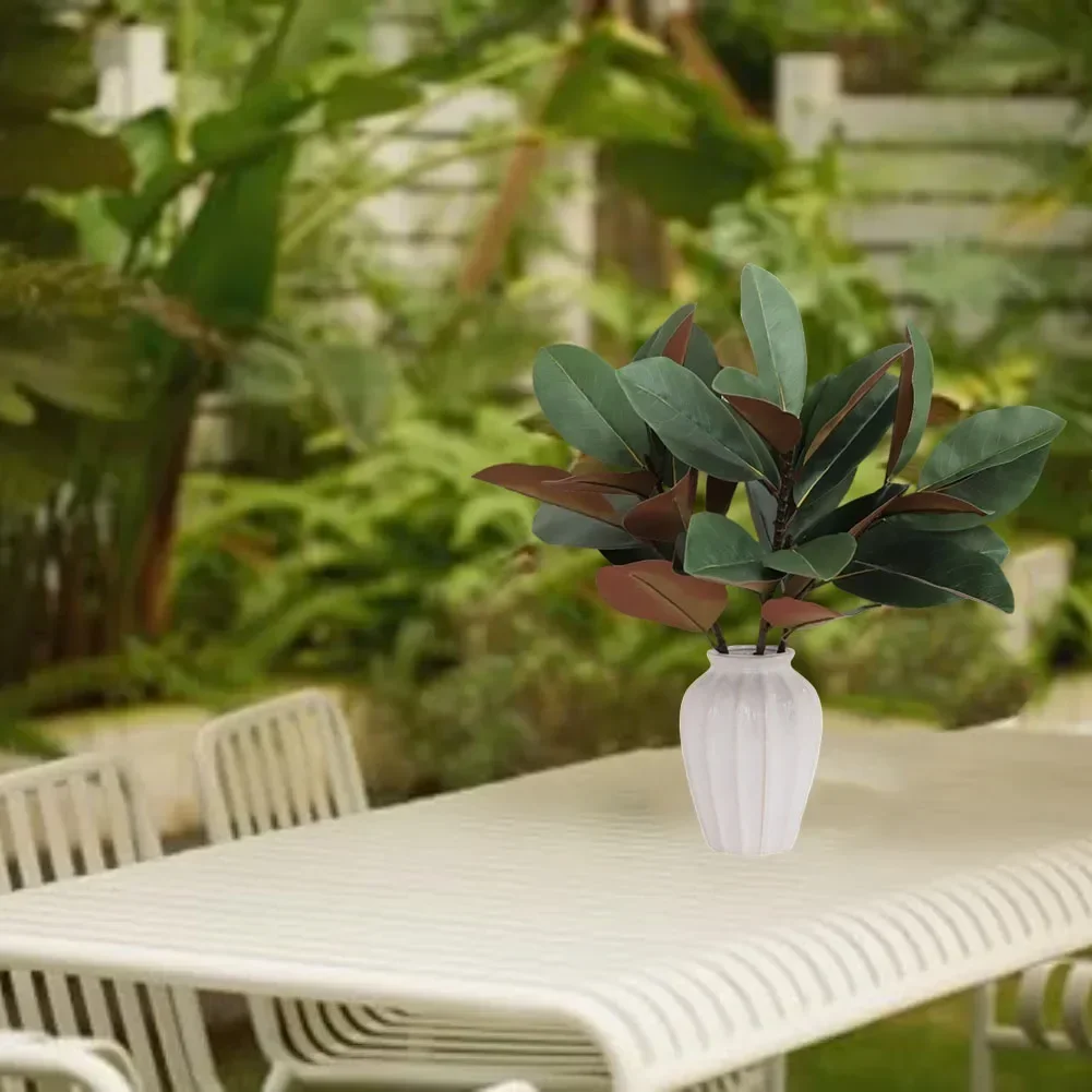 

Artificial magnolia branches with flexible stems and lifelike leaves for home decoration suitable for all seasons two pieces