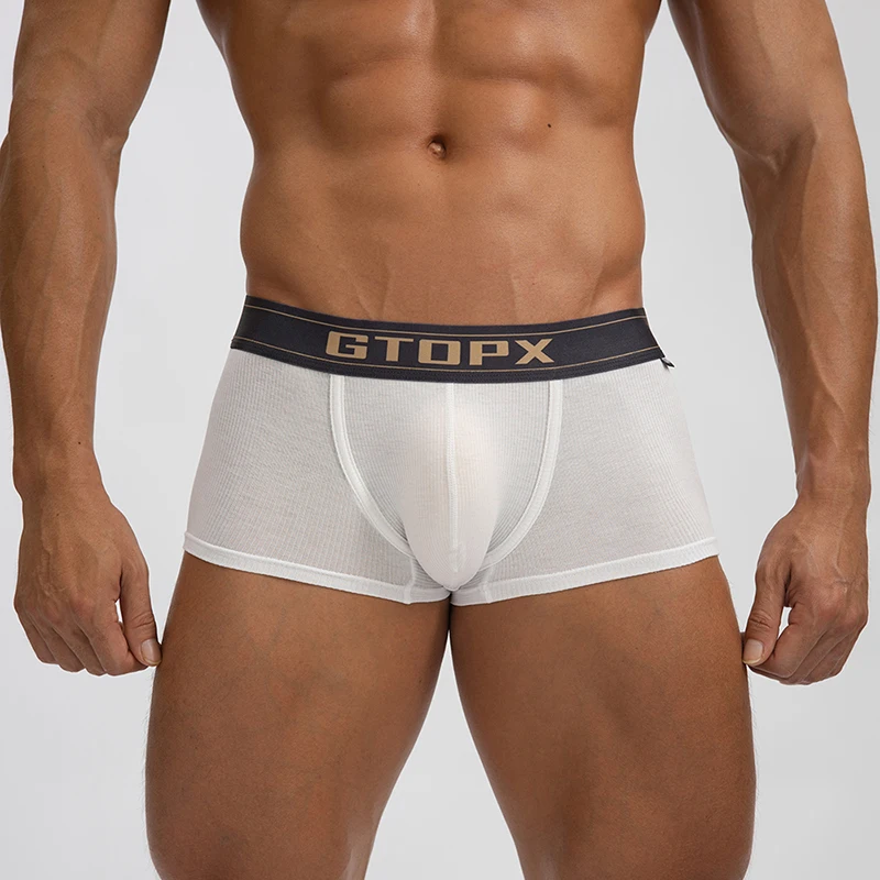 Ropa interior Sexy para hombre, Bóxer suave de Modal, con bolsa para pene y bulto largo, calzoncillos transpirables