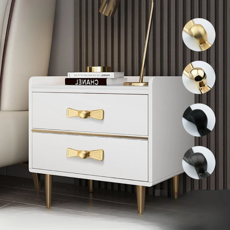 High-end golden and black bedside table handles, wardrobe cabinet drawer handles, and cabinet door handles with decorative bows.