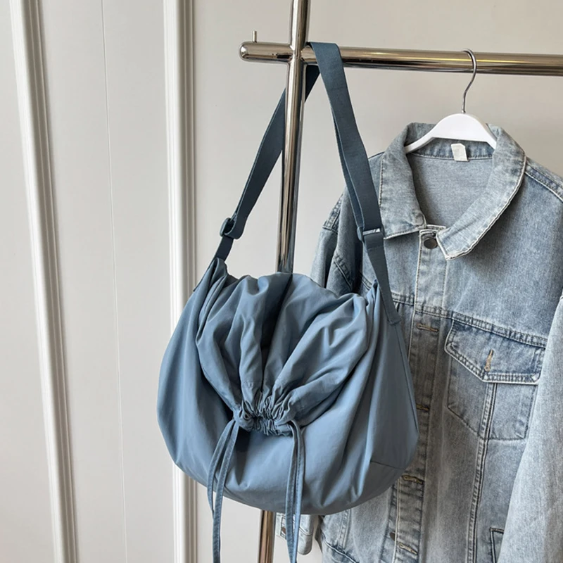 

Large Capacity Drawstring Shoulder Bag For Women Simple Crossbody Bag Adjustable Strap Travel Sling Bag Trendy Female 2025 New