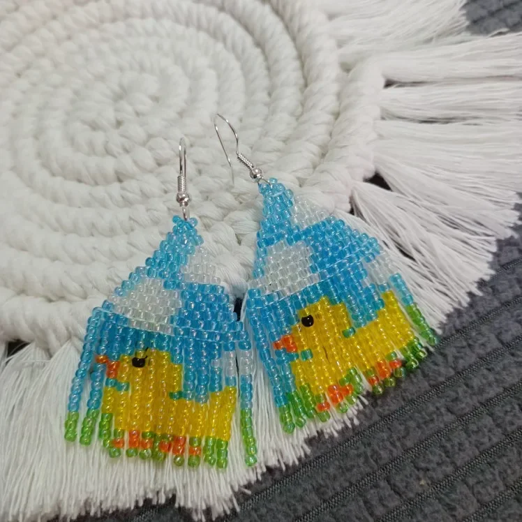 

Beaded earrings Yellow duck tassels originality fashion Simplicity Hand woven Bohemia female alloy Rice bead earrings