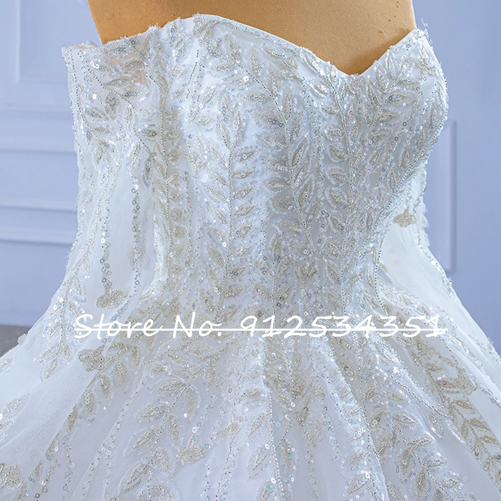 Robe Mariage แขนยาว Tulle ชุดราตรีงานแต่งชุดปิดไหล่ Shining Vestidos De Novia Sequined ประดับด้วยลูกปัด Trouwjurk