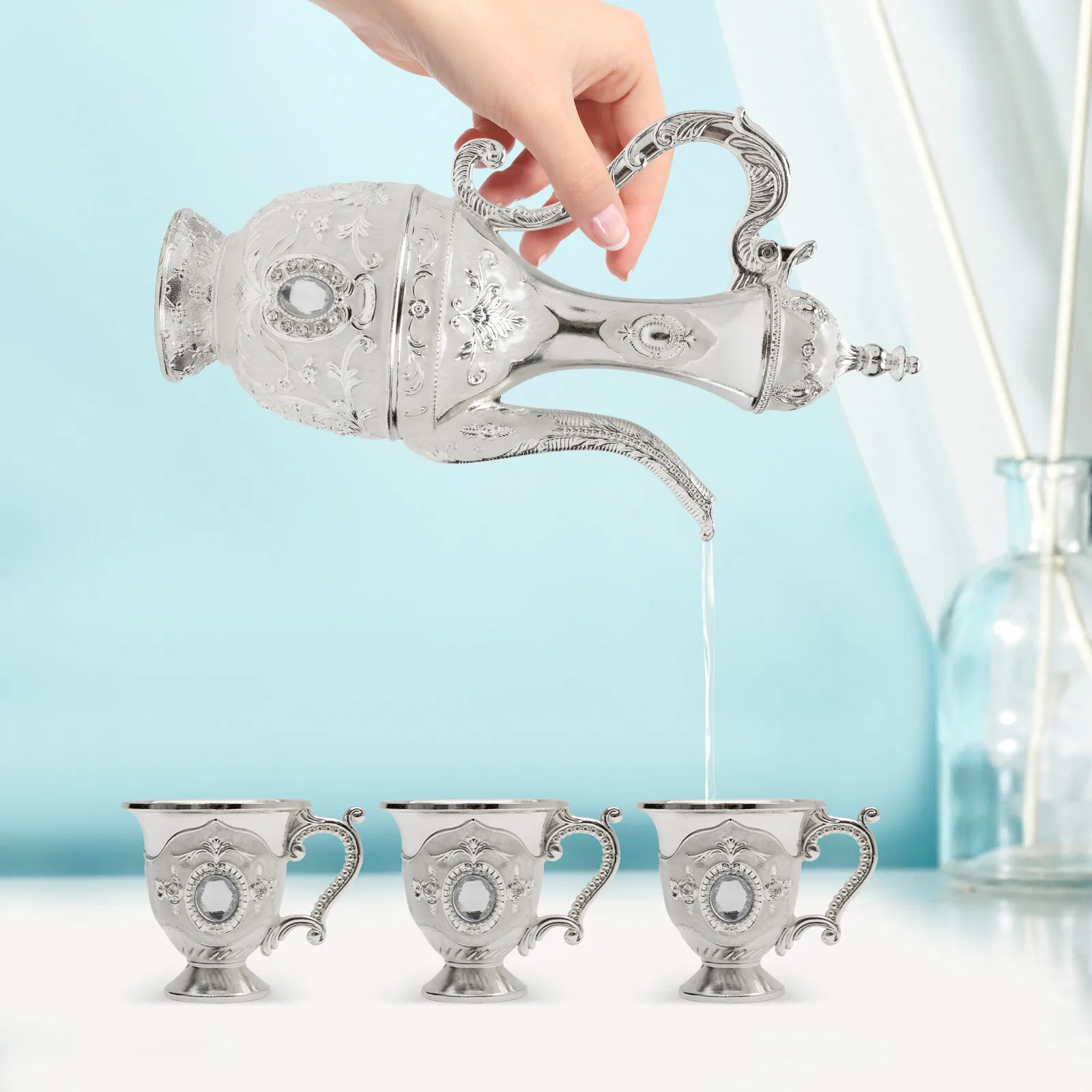 

Exquisite Silver Tea Set Combining Sino-European Carvings, Anti-break Lid & Sinuous Handle, 1.01Oz Each Cup, Ideal for Weddings