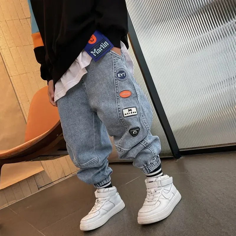 Boys' jeans spring and autumn children's trousers loose and thin section medium and big boy's pants Korean version of casual