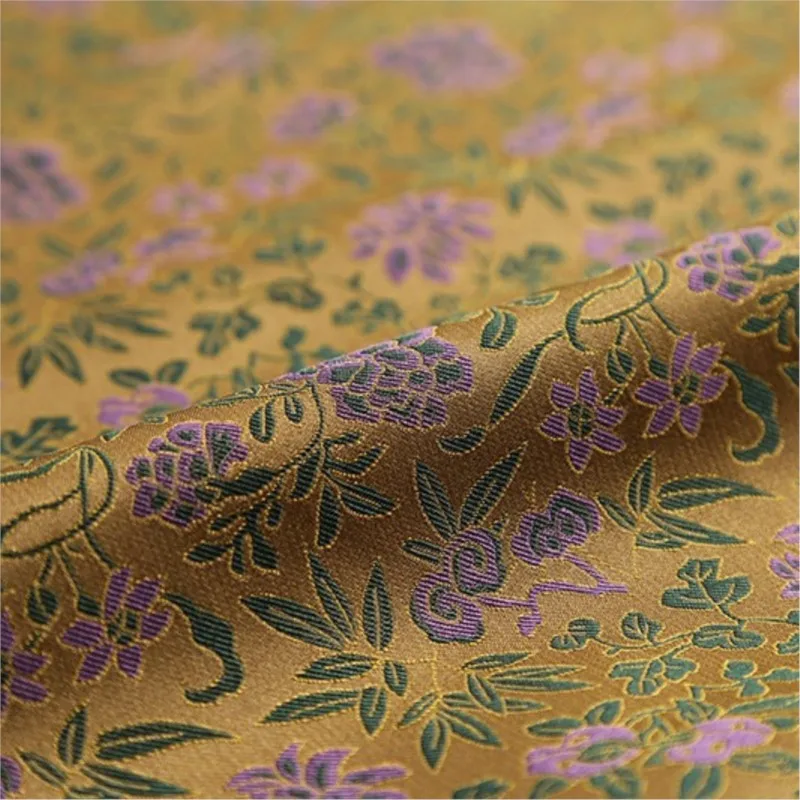 The traditional Chinese-style clothing cheongsam is made of silk fabric and features a flap