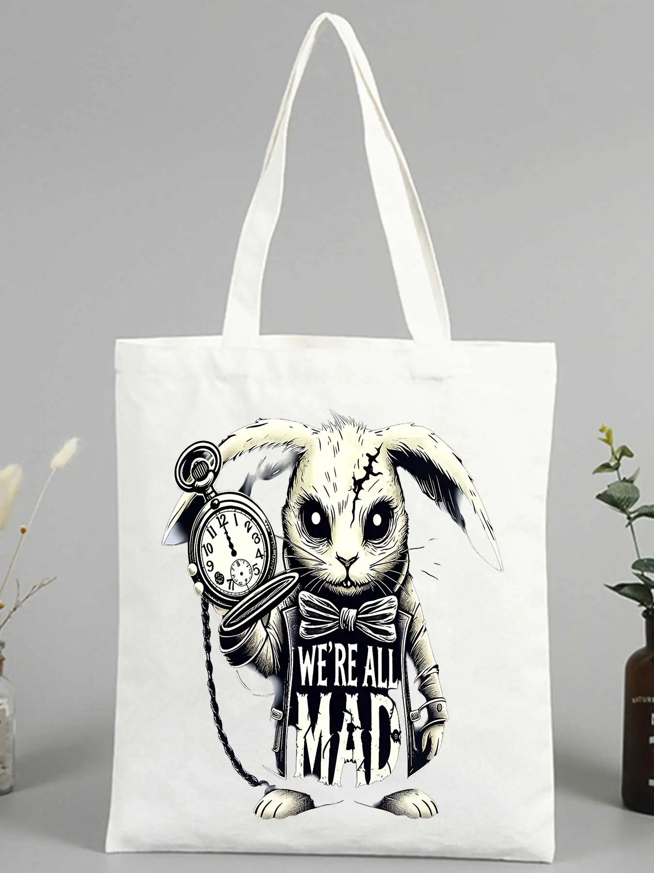 Women's canvas tote bag with rabbit and pocket watch graphic, vintage style for casual shopping and daily use